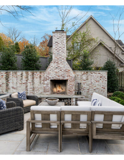Outdoor seating surrounding a firepit.
